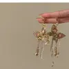 Nuevos Pendientes de Mariposa de Cristal Estilo Maillard 2025 Moda Nicho Lujo Ligero Gama Alta Pendientes con Borlas de Gota de Agua para Mujer