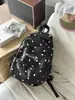 Mochila pequeña con colgante de lunares y estrellas estilo Ins, mochila versátil multicolor para el campus, los desplazamientos y viajes cortos para chicas