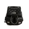 Mochila única de doble hombro, simple y elegante para ir al trabajo, patrón de diamantes, nuevo modelo principios de otoño 2026, alto atractivo estético, cadena de moda, bolso estilo universitario