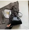 Bolso tipo almohada para mujer 2026 Nuevo Bolso de mano Súper Popular Bolso tote pequeño Bolso de hombro único Cruzado Bolso pequeño dulce con lazo