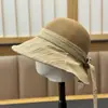 Chapéu de Balde com Patchwork de Tecido Fashion Estilo Coreano com Laço e Borda Enrolada para Mulheres, Chapéu de Sol Versátil para Viagem na Primavera e Verão que Faz o Rosto Parecer Menor