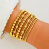Set de Pulseras Versátiles Hechas a Mano con Perlas Doradas Transfronterizo Europeo y Americano, Pulsera Elástica Geométrica Ccb de Lujo Ligero Hb7