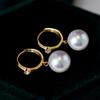 Pendientes de plata S925 bañados en oro de 18 quilates con incrustaciones de circonita y perla. Pendientes con hebilla para la oreja.