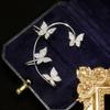Agita el sonido con el colgante de mariposa para la oreja sin agujeros en la oreja puede usar colgante de mariposa de diamante pendientes creativos para mujer versátil dulce