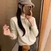 Suéter de punto cruzado estilo coreano, simple y elegante, que reduce la edad, de cuello alto medio con botones para mujer, nueva moda otoño/invierno 2026, holgado y suave