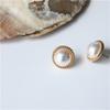 Pendientes de estilo Dongdaemun coreanos con personalidad, pendientes de perla con forma de ojo de gato, alfiler de Tremella, joyería para mujer al por mayor