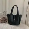 Bolso cruzado de hombro minimalista transfronterizo para mujer con un toque de alta gama, bolso tipo cubo clásico para niñas, estilo de nicho versátil y de alta gama