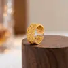 Anillo de flor hueca con incrustaciones de diamantes de plata pura 999 para mujer, sensación de lujo ligero de alta gama, acabado cepillado, artesanía pesada, joyería hecha a mano al por mayor