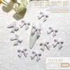 Ins Celebridad de Internet popular resina joyería para uñas al por mayor cinta de color lazo diy corbata de lazo tridimensional accesorios para uñas