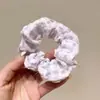 Cuerda para el cabello estilo coreano cerdo anillo para el cabello intestino grueso a cuadros a rayas cuerda para el cabello celebridad de internet chica bolas de salchicha gorda anillo para el cabello al por mayor