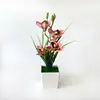 Plantas de orquídeas artificiales al por mayor para comercio exterior, plantas verdes decorativas para decoración de sala de estar, restaurante y pub, bonsái de flores artificiales