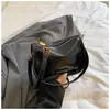 Bolso de mujer estilo coreano, simple y elegante, nuevo bolso de hombro casual de nicho 2026 con un toque de alta gama, bolso cuadrado pequeño versátil y moderno
