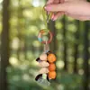Estilo Mori Borla Natural Cáscara de Fruta Sonajero Colgante DIY Estilo Bohemio Retro Cuerda Colorida Carrillón de Viento Colgante para Bolsa Decoración de Coche