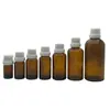 Em estoque frascos de óleo essencial âmbar 5-100ml conservação de óleo essencial subembalagem cosmética frascos de vidro cor âmbar marrom que evitam a luz