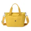 Bolso cubo liso transfronterizo nuevo minimalista, versátil para ir al trabajo, ligero, moda de nicho, bolso de hombro de otoño