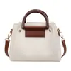 Tendencia transfronteriza 2026 nuevo set de bolsas para madre e hijo bolso versátil de un solo hombro y cruzado de moda bolso cubo de nicho texturizado para llevar en la mano