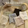 Pantaletas triangulares sin costuras de seda helada para niñas con ribete de encaje, transpirables y cómodas, de cintura media, estilo puro y seductor