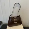 Nuevo modelo de otoño temprano 2026, alto atractivo estético, calidad, moderno, lujo discreto, simple, elegante, versátil bolso de hombro y axila para ventas transfronterizas