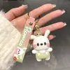 Lindo llavero de Sanrio con colgante de muñeco de dibujos animados para coche, accesorios para bolso, adornos colgantes, pequeño regalo al por mayor