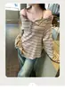 Camiseta Rayada de Manga Larga Estilo Retro Perezoso para Mujer Otoño 2025 Nueva Casual de un Solo Hombro Aspecto Adelgazante Top Base Suelto