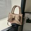 Bolso de mano retro de moda para mujer nuevo 2024 Verano bolso bandolera con lazo texturizado Corea del Sur bolso pequeño portátil