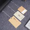 Etiqueta de textura de lodo de diatomeas papel de textura especial marca registrada de alta calidad para mujer etiqueta de precio de accesorios para ropa de ascensor
