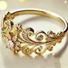 Anillo vintage HuaJie de venta caliente transfronteriza en Temu, estilo retro con diseño floral hueco tallado e incrustaciones de circonita para mujer