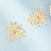 Pendientes Huecos Geométricos de Metal con Diseño de Flor para Mujer, Pendientes Elegantes Simples de Lujo Ligero Transfronterizos Europeos y Americanos