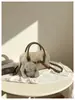 Otoño Temprano 2026 Nuevo Bolso Peludo Elegante Chic de Lujo Ligero para Mujer Bolso de Hombro Único de Gama Alta Bolso Cruzado Simple Versátil