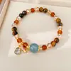 Pulsera de cuentas de ojo de tigre, sensación de lujo ligero de nicho de alta gama, accesorio de mano versátil estilo Maillard