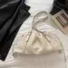 Elegante y con estilo, bolsa tejida de cordón de cuero genuino con forma de nube, bolso de mano plisado, nuevo modelo de verano, bolso de hombro simple para el día a día.