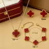 Conjunto de Joias de Aço Titânio Flor Cruzada Trevo de Quatro Folhas de Alto Padrão, Pulseira, Colar e Brincos 15mm, Três Peças, Luxo Leve, Nicho, Atacado