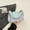 Bolsas populares de nicho de varios años para mujer otoño 2026 nuevo estilo bolso cruzado texturizado bolso de mano bolso de hombro único para debajo del brazo