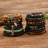 TEMU Xiyin producto nuevo transfronterizo estilo bohemio cuenta de madera de cáscara de coco pulsera elástica para hombre pulsera de muñeca