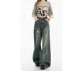 Jeans de pierna ancha acampanados rasgados estilo retro americano para mujer, nuevo modelo verano 2026, pantalones holgados y adelgazantes de longitud hasta el suelo