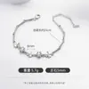Venta caliente transfronteriza venta directa de fábrica pulsera de la suerte de flor de seis pétalos hoja de bambú joyería de mano de imitación de plata de alta textura para mujer