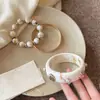 Nuevo brazalete de flor geométrica irregular transfronterizo europeo y americano, brazalete de diseño de nicho a la moda, joyería única y moderna