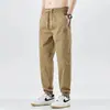 Directo del fabricante, pantalones jogger para hombre de nuevo estilo, tiro medio, color liso, pantalones casuales de trabajo para hombre, pantalones deportivos de verano
