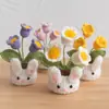 Flor de Lirio del Valle Tejida a Crochet Hecha a Mano de Lana en Maceta Producto Terminado Venta al por Mayor Muñeco de Conejo Creativo Adornos de Escritorio en Maceta Flores Tejidas