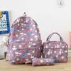 Nueva y bonita mochila escolar de gran capacidad para estudiantes de secundaria y universitarios, mochila informal de tres piezas de alto valor.