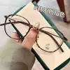 Marco de Lentes de Moda Retro Trendy Literario Verde Oliva Ovalado Ultraligero y Cómodo para Hombres y Mujeres Marco Óptico