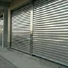 Puerta de persiana de acero inoxidable, puerta rápida enrollable de aleación de aluminio hueco, tienda, comunidad, villa, puerta enrollable eléctrica