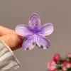Nuevo pasador de pelo acrílico de frangipani de colores, pinza de flor, accesorio para el cabello elegante y sofisticado para mujer, pinza de tiburón lateral