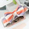 Diadema deportiva de coral fleece estilo coreano para el baño, banda para el pelo femenina, diadema de felpa con lazo para lavarse la cara y el maquillaje, tocado, venta al por mayor