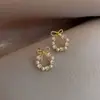 Pendientes pequeños de lazo coreanos, nuevo estilo de celebridad de internet de moda, pendientes de botón versátiles para mujer, aleación de zinc dorada y plateada