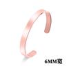 Apertura ajustable diseño grabado brillante logo simple color sólido pulsera de acero inoxidable mujer venta al por mayor