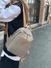 Mochila de moda de alta gama transfronteriza 2025 nueva ligera para viajes sencilla mochila estudiantil que combina con todo