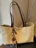 Bolsa tote simples de lona para mulheres, bolsa de ombro grande para o dia a dia, nova coleção outono 2026, cor sólida, estilo descontraído, bolsa de mão