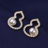 2021 nuevos aretes pequeños de temperamento simple estilo coreano de calabaza de perla de venta caliente accesorios para las orejas de lujo ligero francés al por mayor