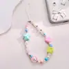 Lindo y fresco cordón para teléfono con cuentas de fresa, adecuado para todas las fundas de teléfono, correa de muñeca anticaída
